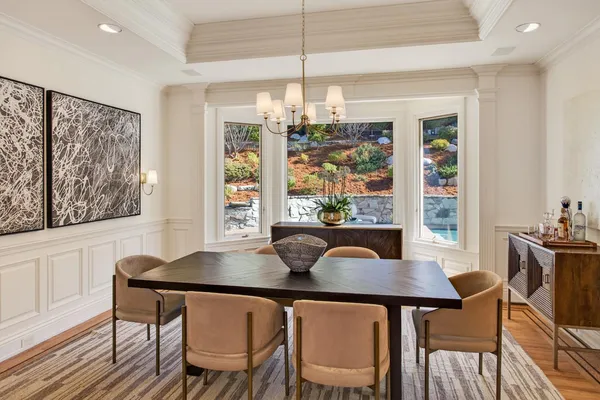 a view of a dining room with furniture window and outside view