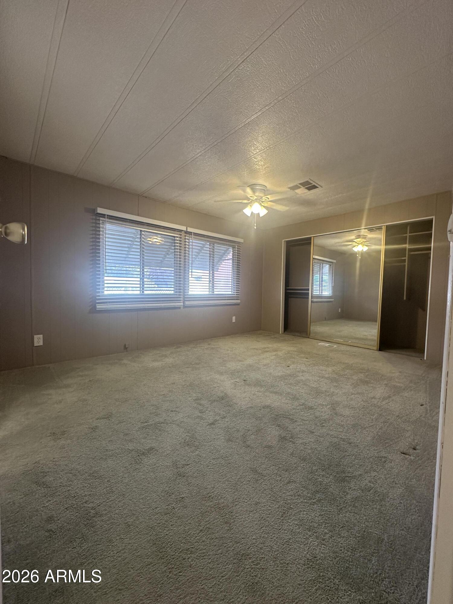 205 Sunset Drive, Unit 108 Sedona, AZ 86336 - Photo 11 of 16 an empty room with a natural light