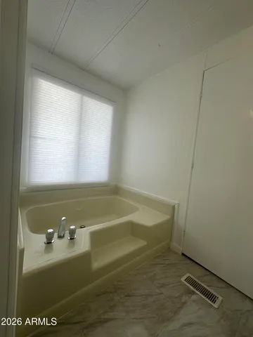 a bathroom with a bathtub