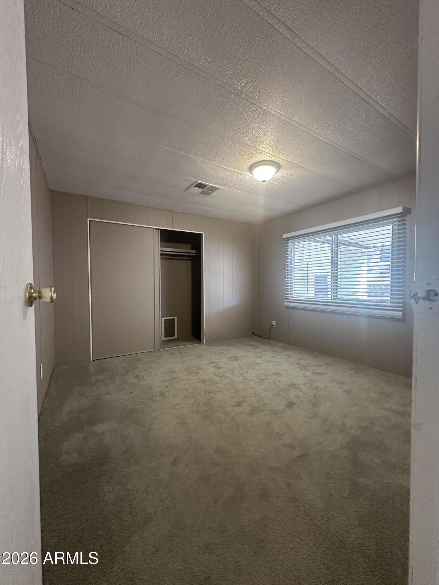 205 Sunset Drive, Unit 108 Sedona, AZ 86336 - Photo 15 of 16 a view of an empty room with a window