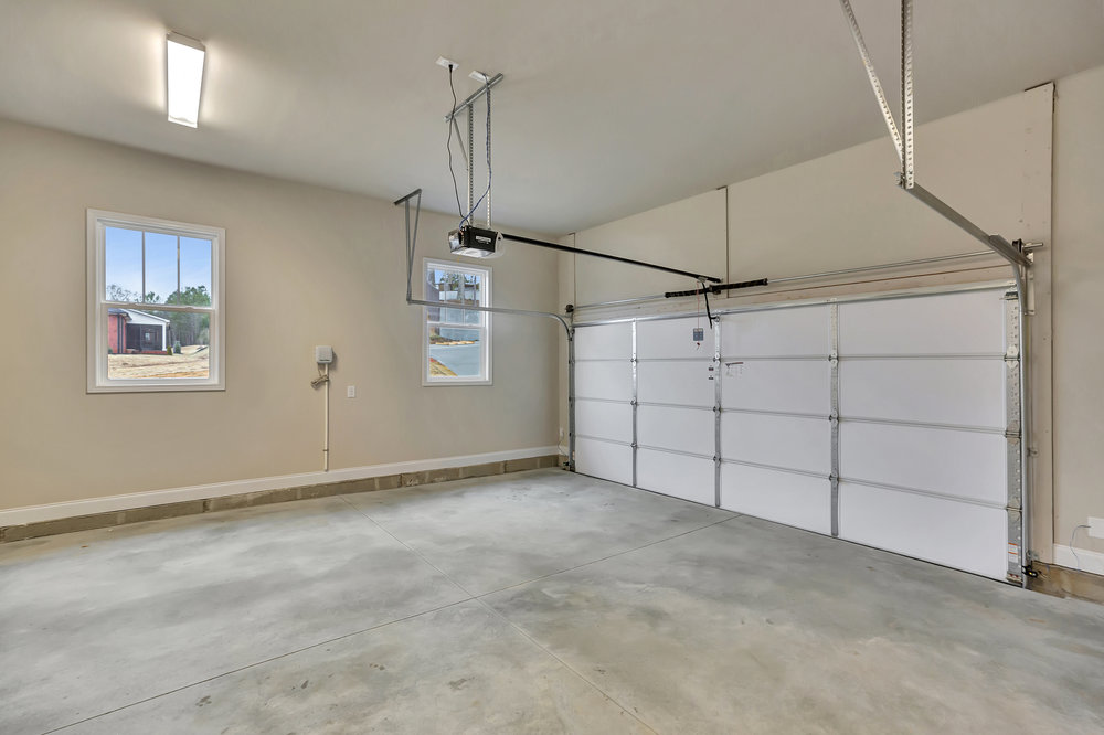 118 Bonaire Point Anderson, SC 29621 - Photo 13 of 23 This spacious garage offers ample room and direct outdoor views.
