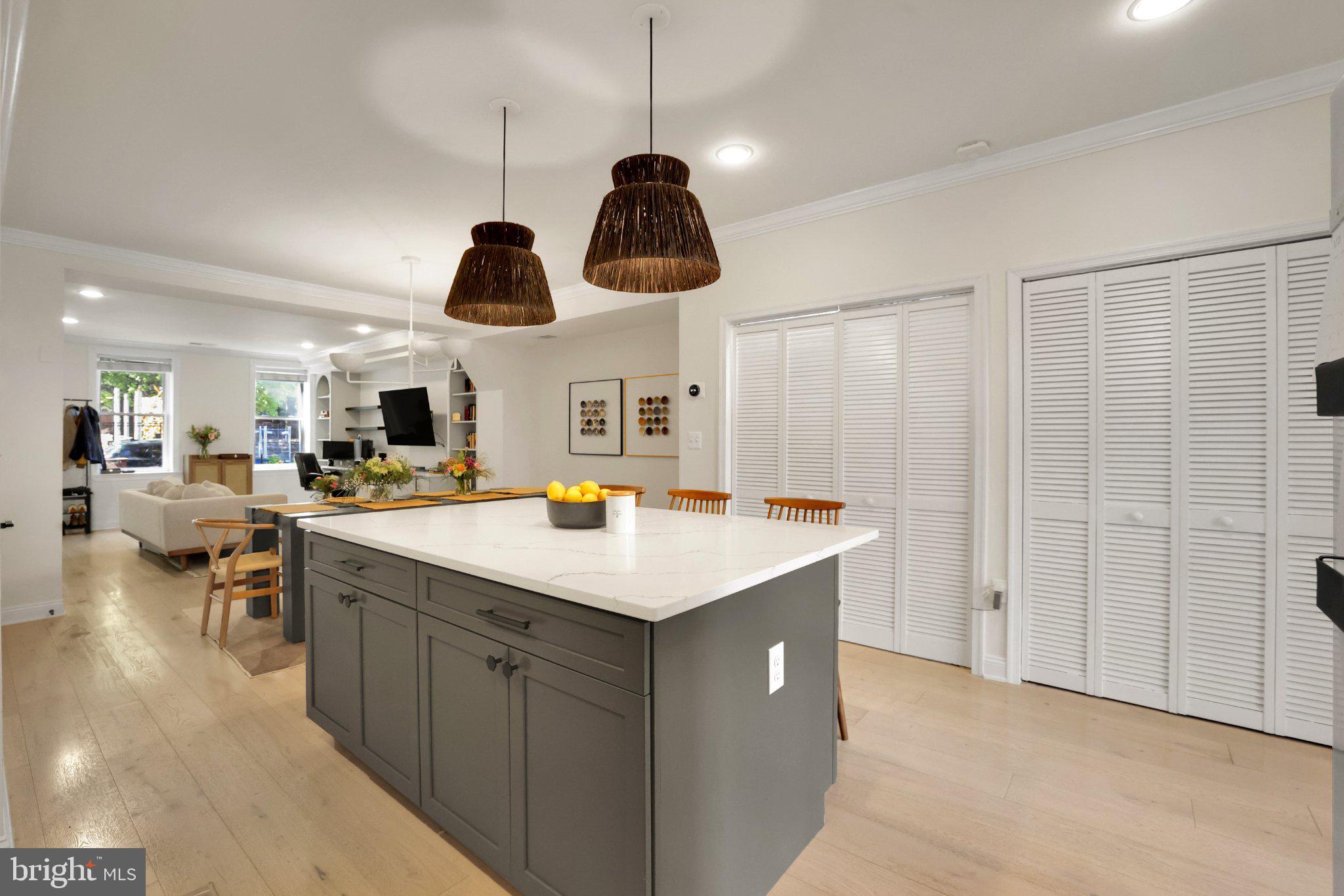 407 O Street Northwest Washington, DC 20001 - Photo 17 of 47 Modern kitchen with stylish island.