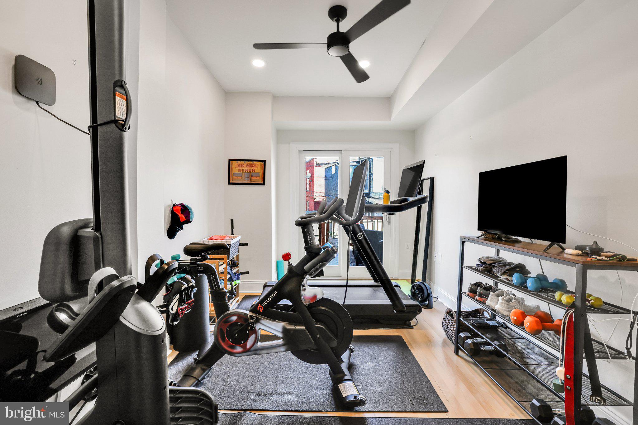 407 O Street Northwest Washington, DC 20001 - Photo 30 of 47 Modern fitness space with natural light.