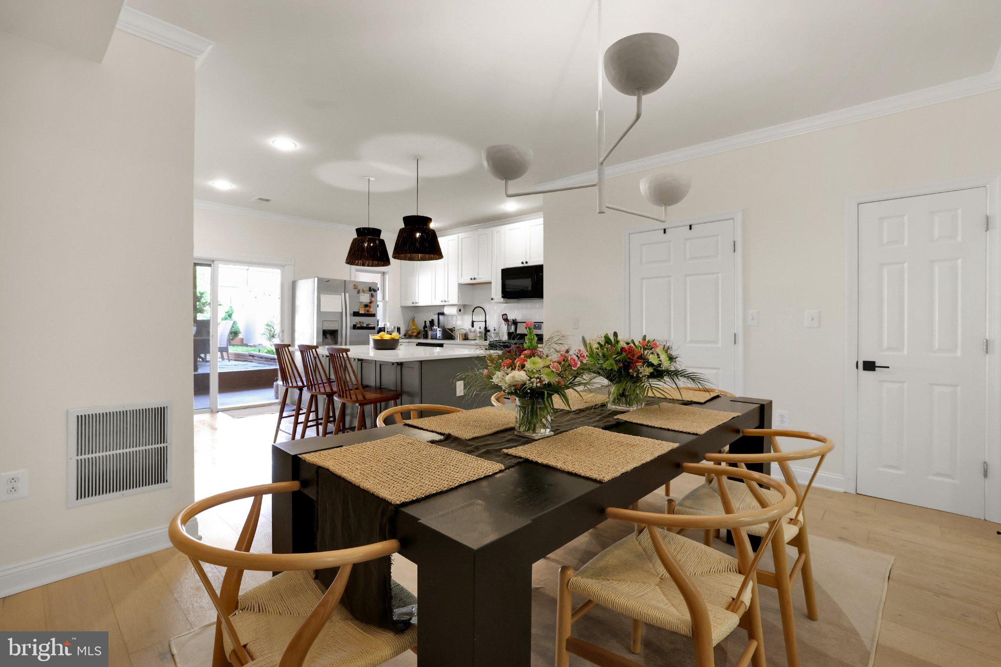 407 O Street Northwest Washington, DC 20001 - Photo 10 of 47 Modern kitchen with elegant dining space.