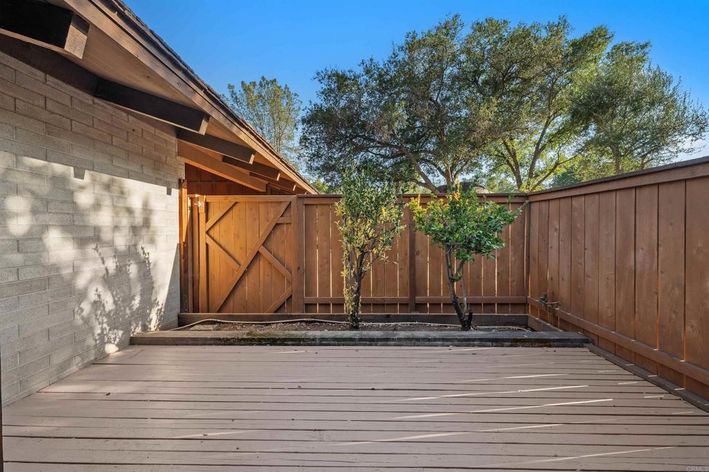 16522 Orchard Bend Road Poway, CA 92064 - Photo 13 of 26 a view of a house with a small yard