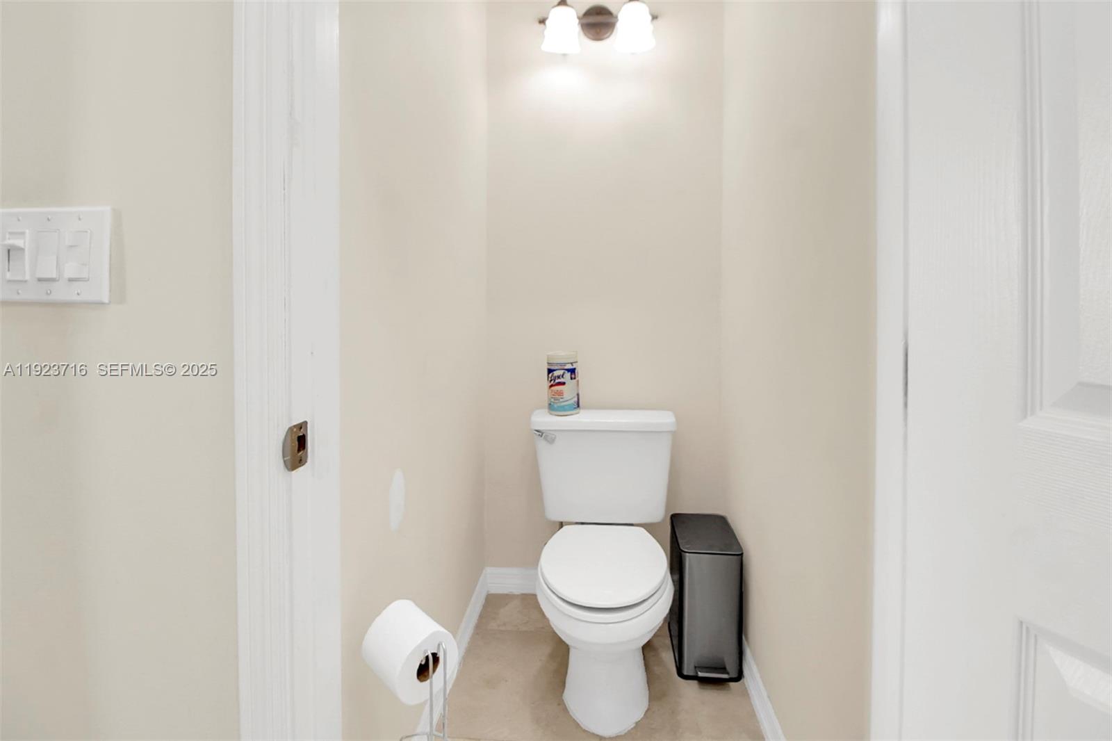 15875 Southwest 149th Lane Miami, FL 33196 - Photo 14 of 32 a white toilet sitting next to a white sink