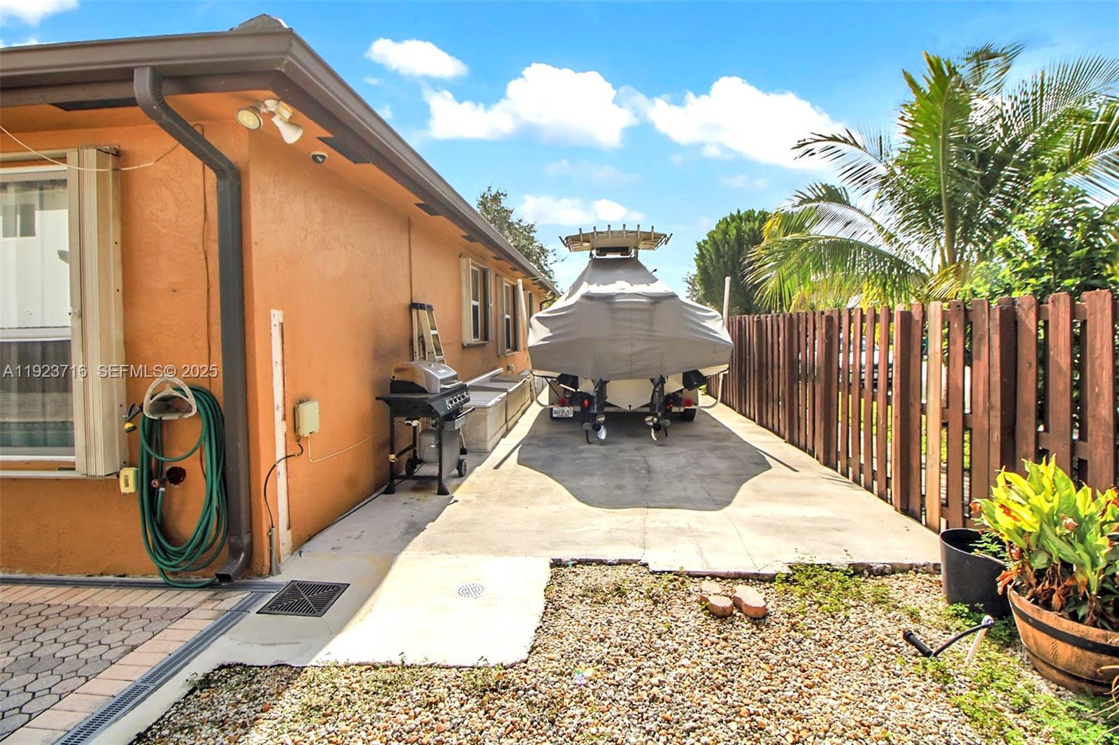 15875 Southwest 149th Lane Miami, FL 33196 - Photo 23 of 32 a view of a house with backyard and sitting area