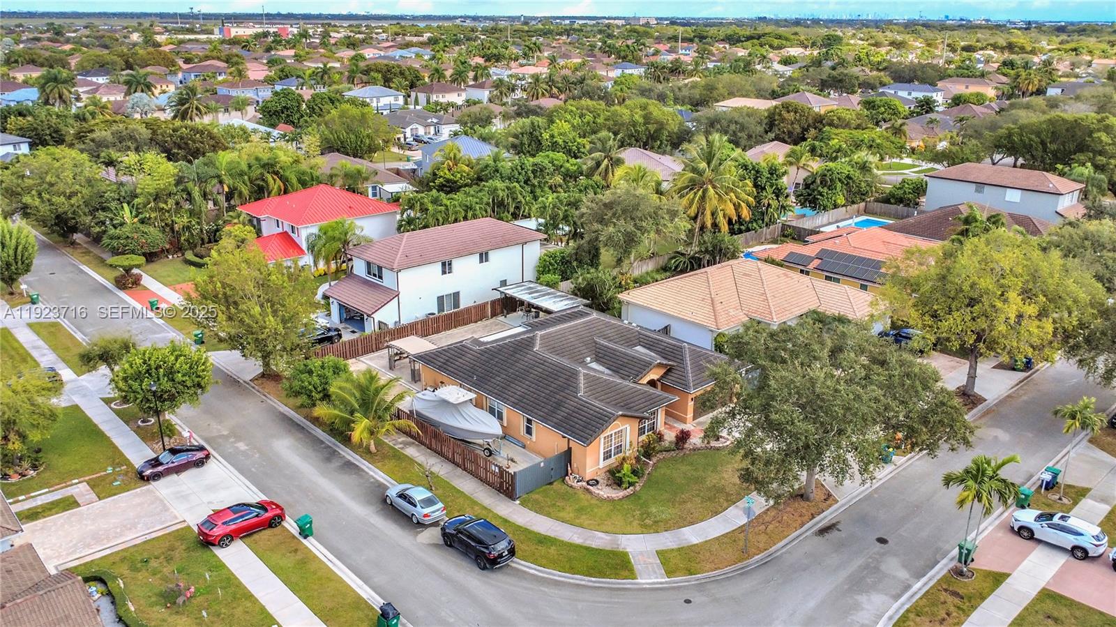 15875 Southwest 149th Lane Miami, FL 33196 - Photo 30 of 32 an aerial view of a house with a swimming pool yard and outdoor seating