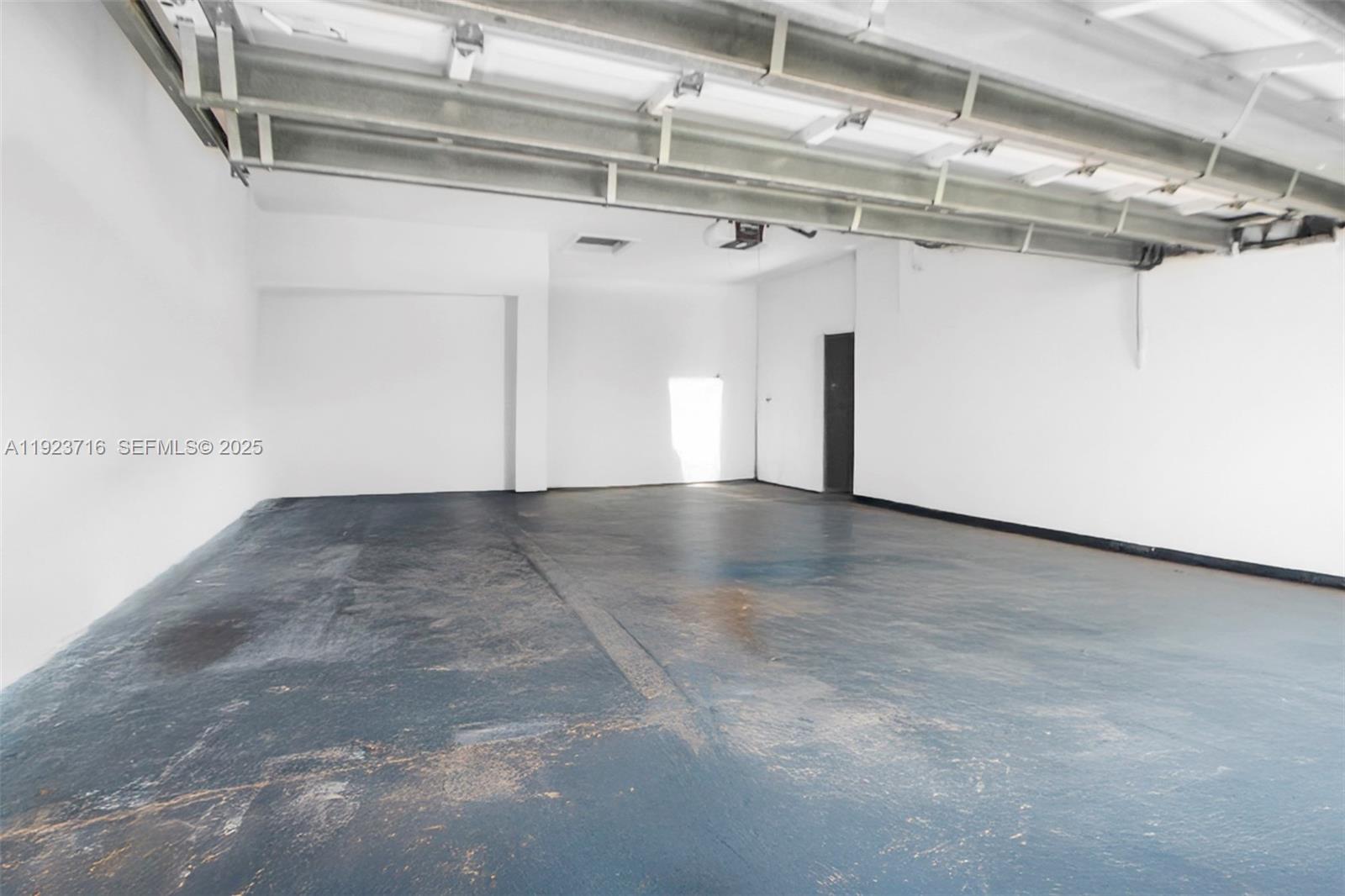 15875 Southwest 149th Lane Miami, FL 33196 - Photo 32 of 32 a view of a garage