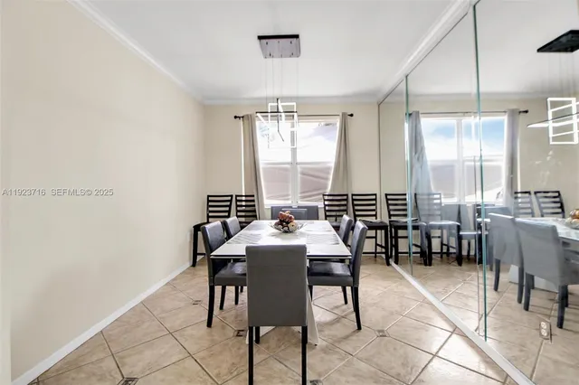 a living room with furniture and window