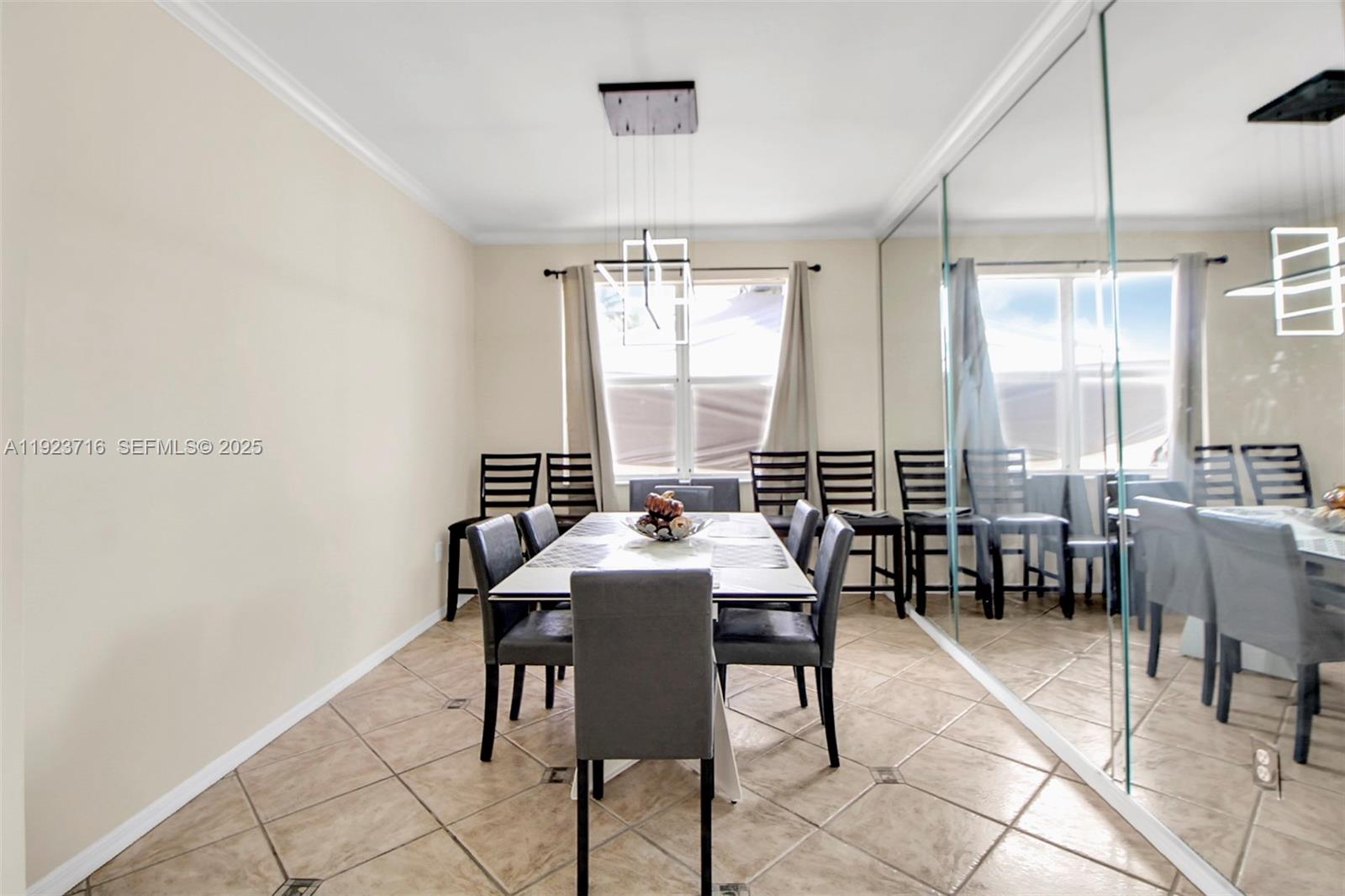 15875 Southwest 149th Lane Miami, FL 33196 - Photo 9 of 32 a view of a dining room with furniture window and outside view