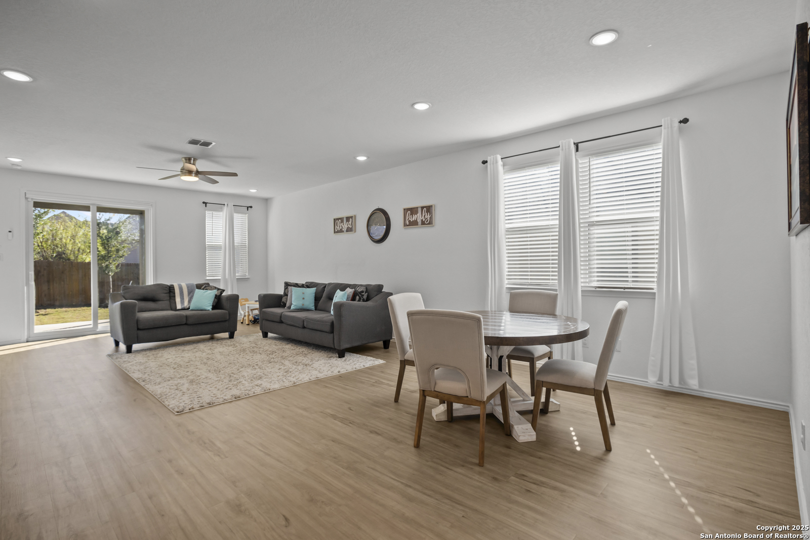13222 Hagerd Loop St. Hedwig, TX 78152 - Photo 11 of 37 a living room with furniture and a window