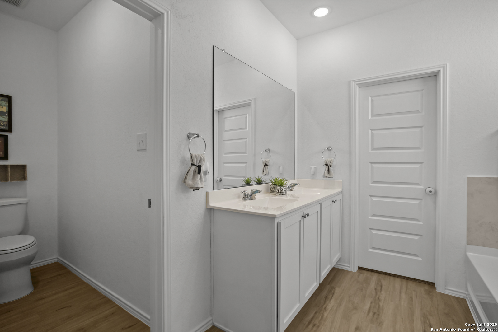 13222 Hagerd Loop St. Hedwig, TX 78152 - Photo 18 of 37 a bathroom with a sink toilet and shower