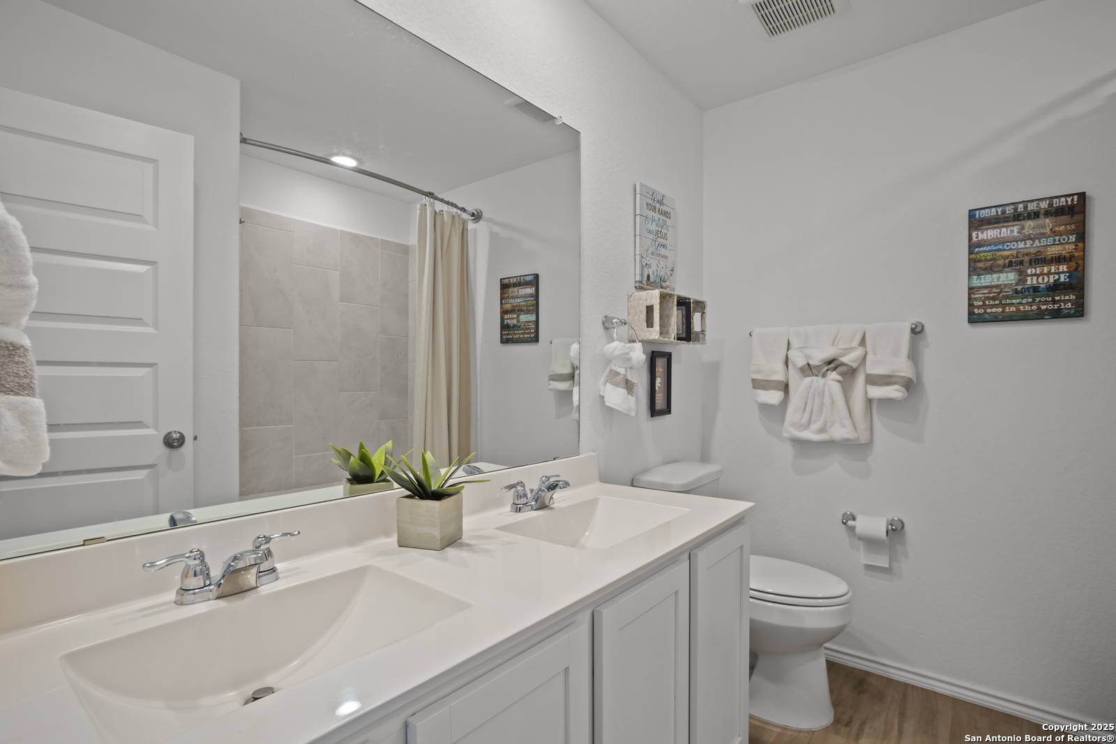 13222 Hagerd Loop St. Hedwig, TX 78152 - Photo 26 of 37 a bathroom with a sink toilet and shower
