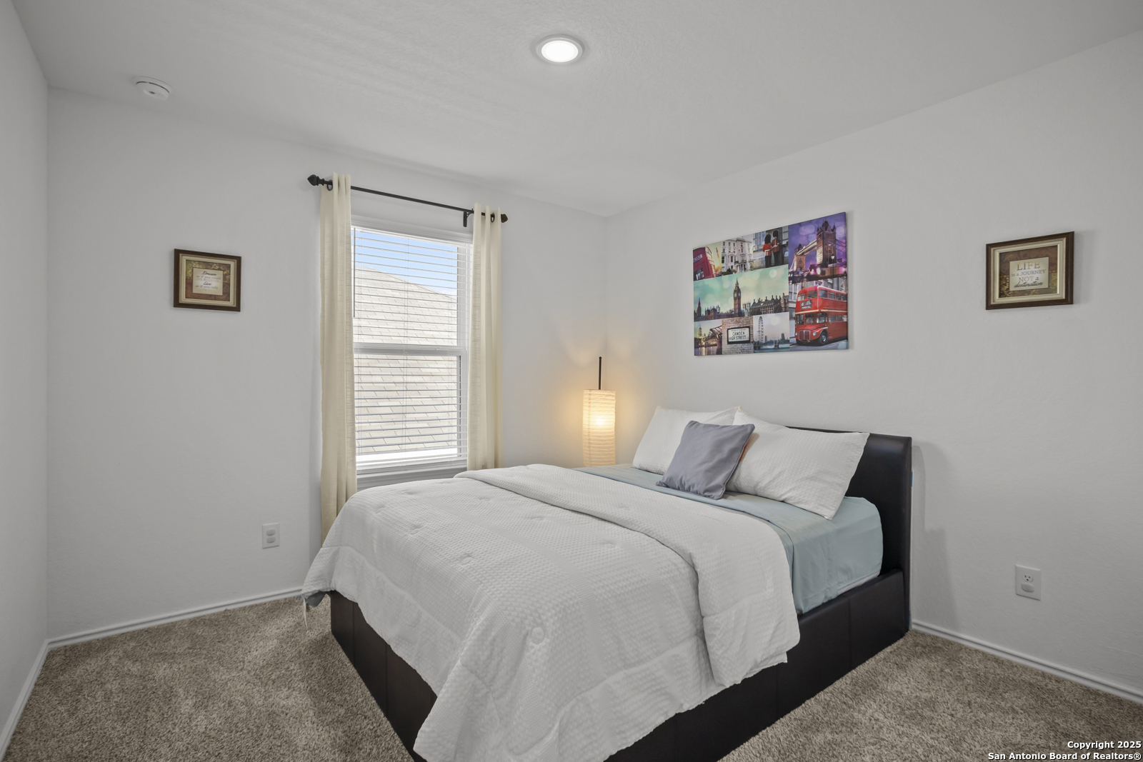13222 Hagerd Loop St. Hedwig, TX 78152 - Photo 27 of 37 a bedroom with a bed and a window