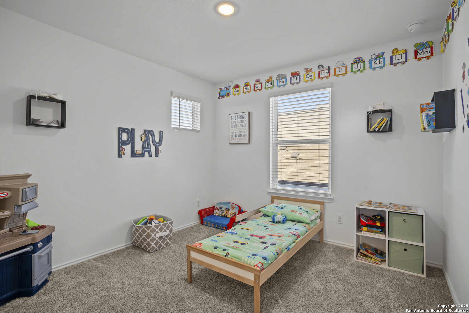 13222 Hagerd Loop St. Hedwig, TX 78152 - Photo 29 of 37 a bedroom with furniture and a window