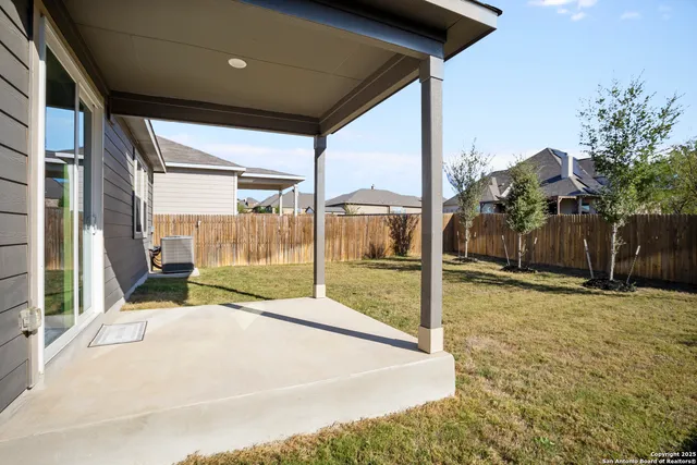 a house with trees in front of it