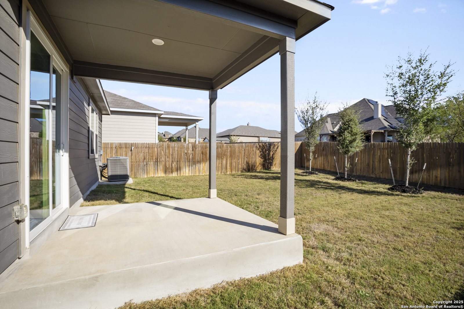 13222 Hagerd Loop St. Hedwig, TX 78152 - Photo 35 of 37 a house with trees in front of it