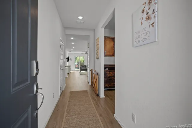 a view of a hallway with a furniture