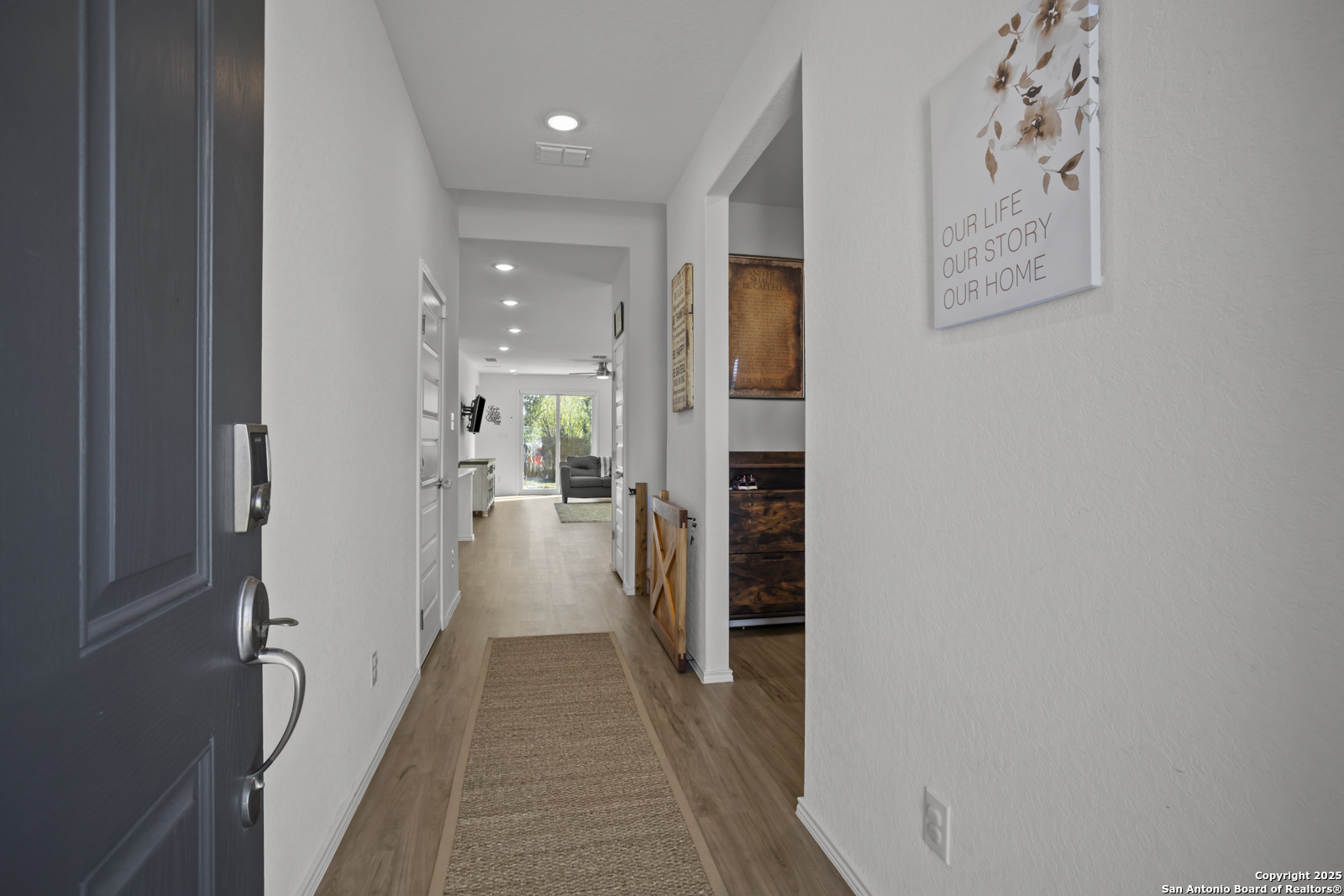 13222 Hagerd Loop St. Hedwig, TX 78152 - Photo 4 of 37 a view of a hallway with a furniture