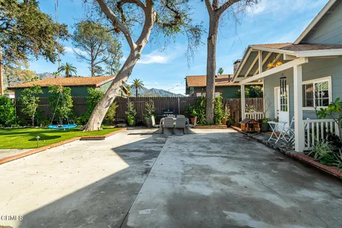 a view of a park with swings and slides