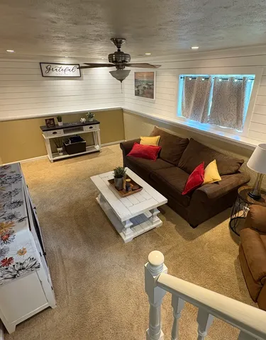 a living room with furniture and a couch