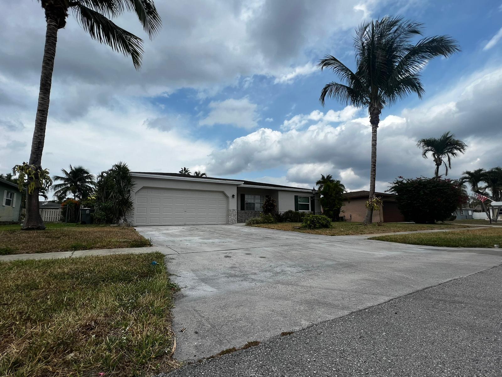 4585 Betelnut Street Boca Raton, FL 33428 - Photo 6 of 27 Driveway