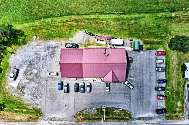 a view of a yard with an ocean
