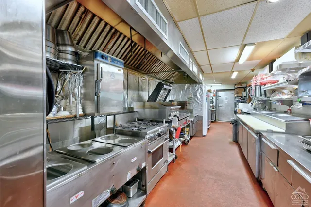 a view of a house with a yard porch and sitting area