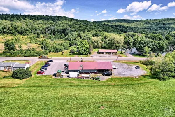 an aerial view of a house with a garden