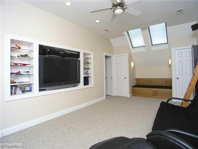 6004 Chalet Drive Oak Ridge, NC 27310 - Photo 12 of 16 Other. Smart design of this nicely-sized room allows for plenty of natural light, seating area, storage and easy access to a full bathroom.