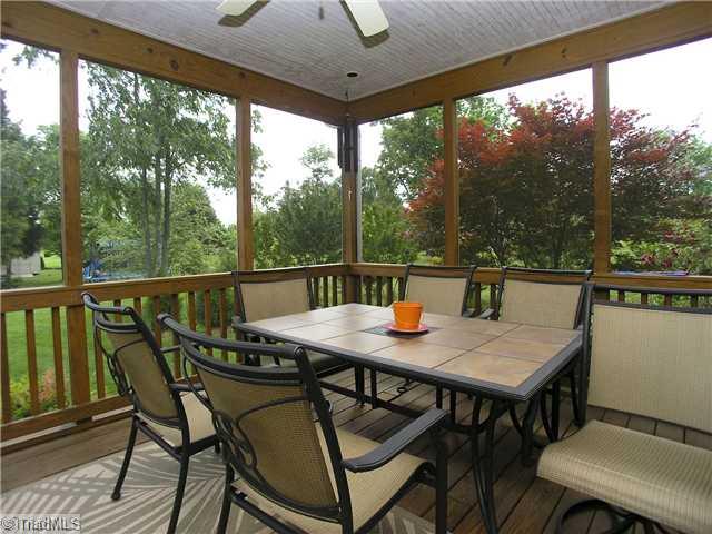 6004 Chalet Drive Oak Ridge, NC 27310 - Photo 13 of 16 Enclosed Porch. Wow- imagine relaxing on this wonderful Screened Porch!