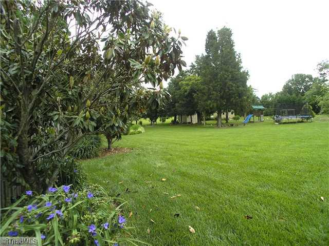 6004 Chalet Drive Oak Ridge, NC 27310 - Photo 14 of 16 Land. Park-like setting with professinal grade landscaping