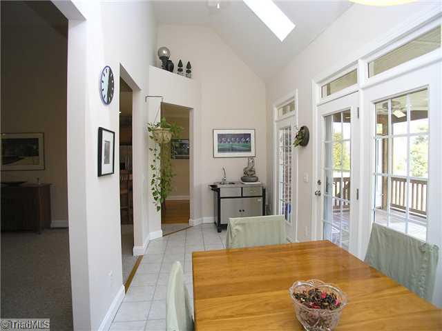 6004 Chalet Drive Oak Ridge, NC 27310 - Photo 5 of 16 Sunroom. Enjoy Bright Sunroom while reading or having breakfast and planning a great day