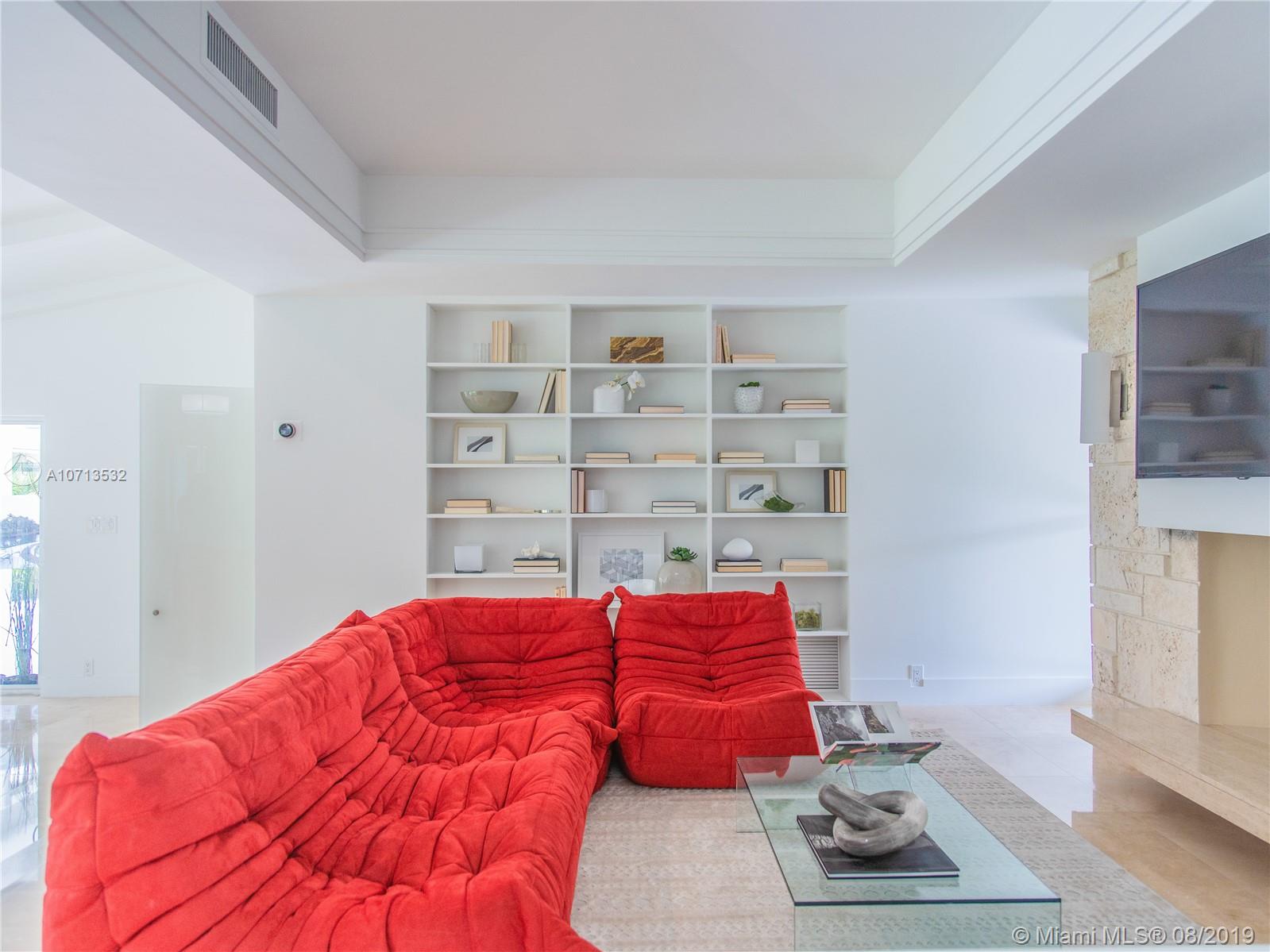 4765 Lake Road Miami, FL 33137 - Photo 14 of 30 a bedroom with a bed and window