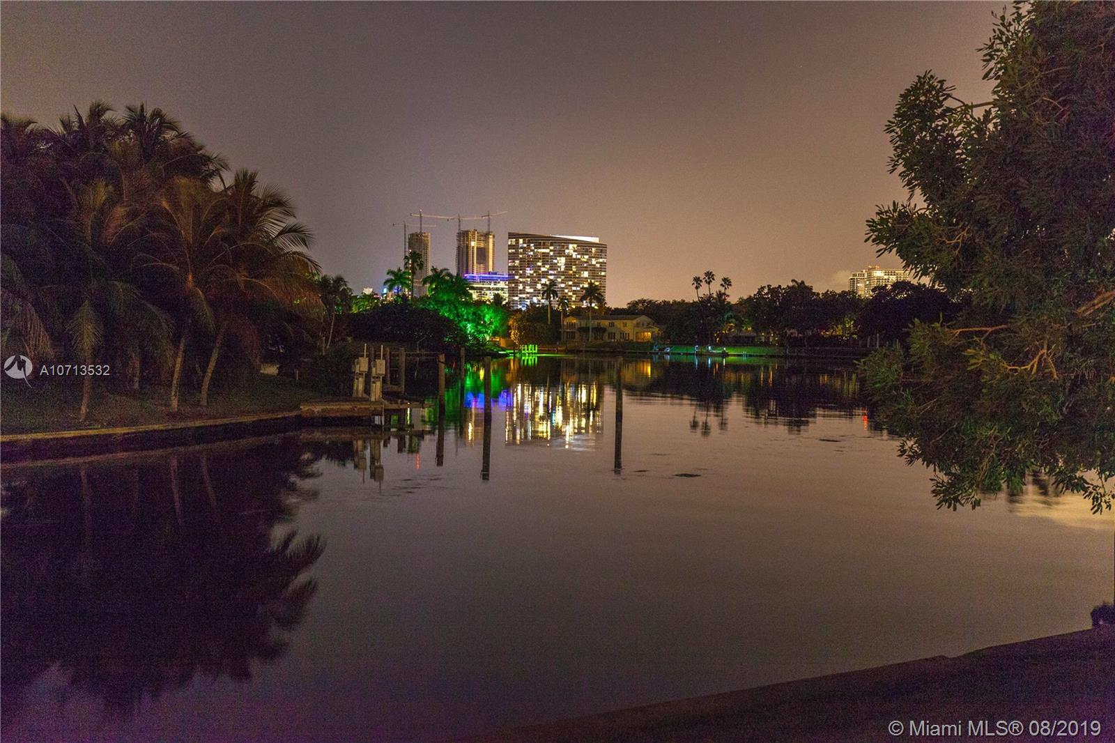 4765 Lake Road Miami, FL 33137 - Photo 5 of 30 a view of river covered by trees and buildings