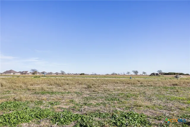 a view of an ocean with a beach