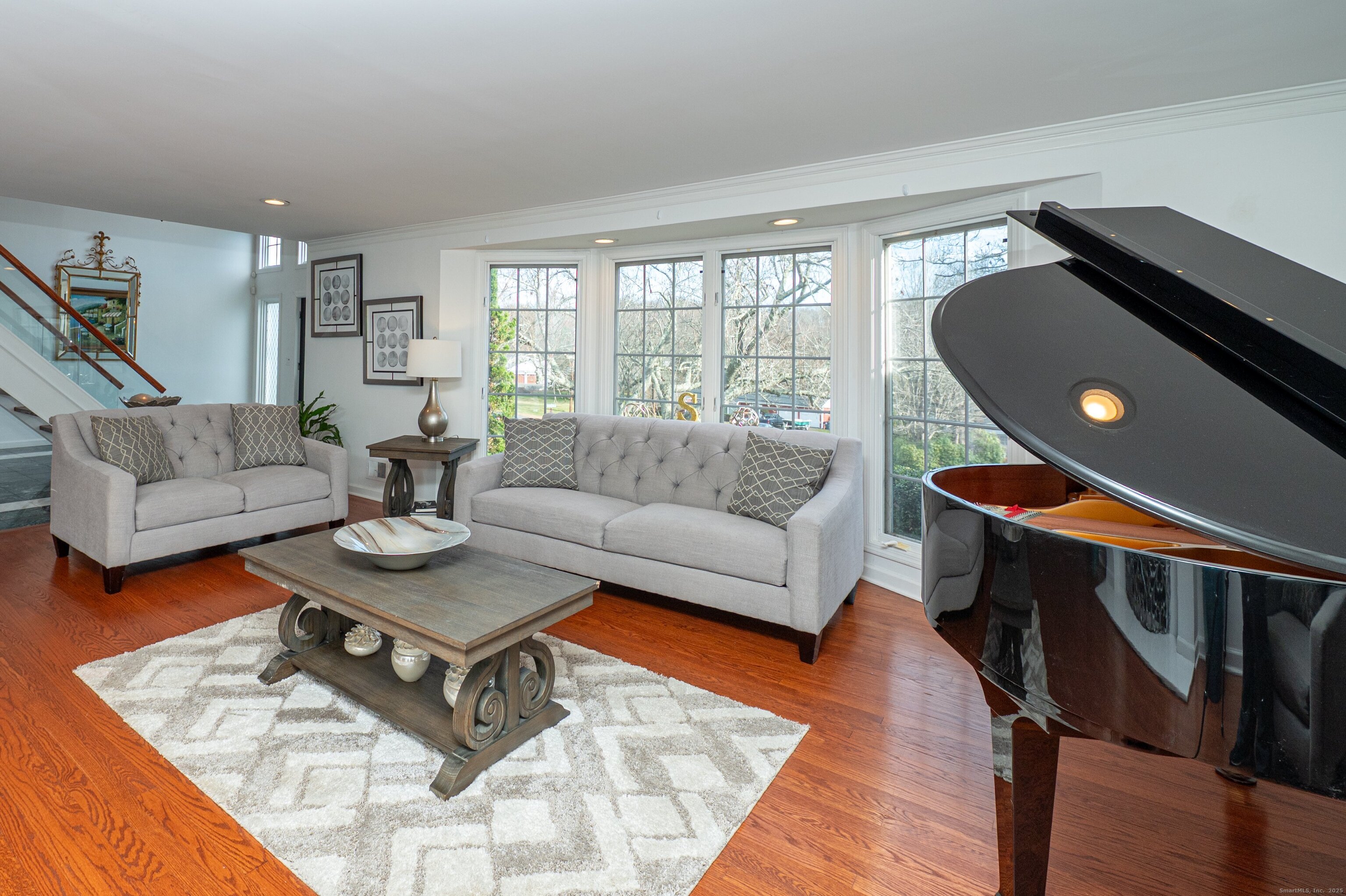 15 Griffing Pond Road Branford, CT 06405 - Photo 11 of 40 a living room with furniture and wooden floor