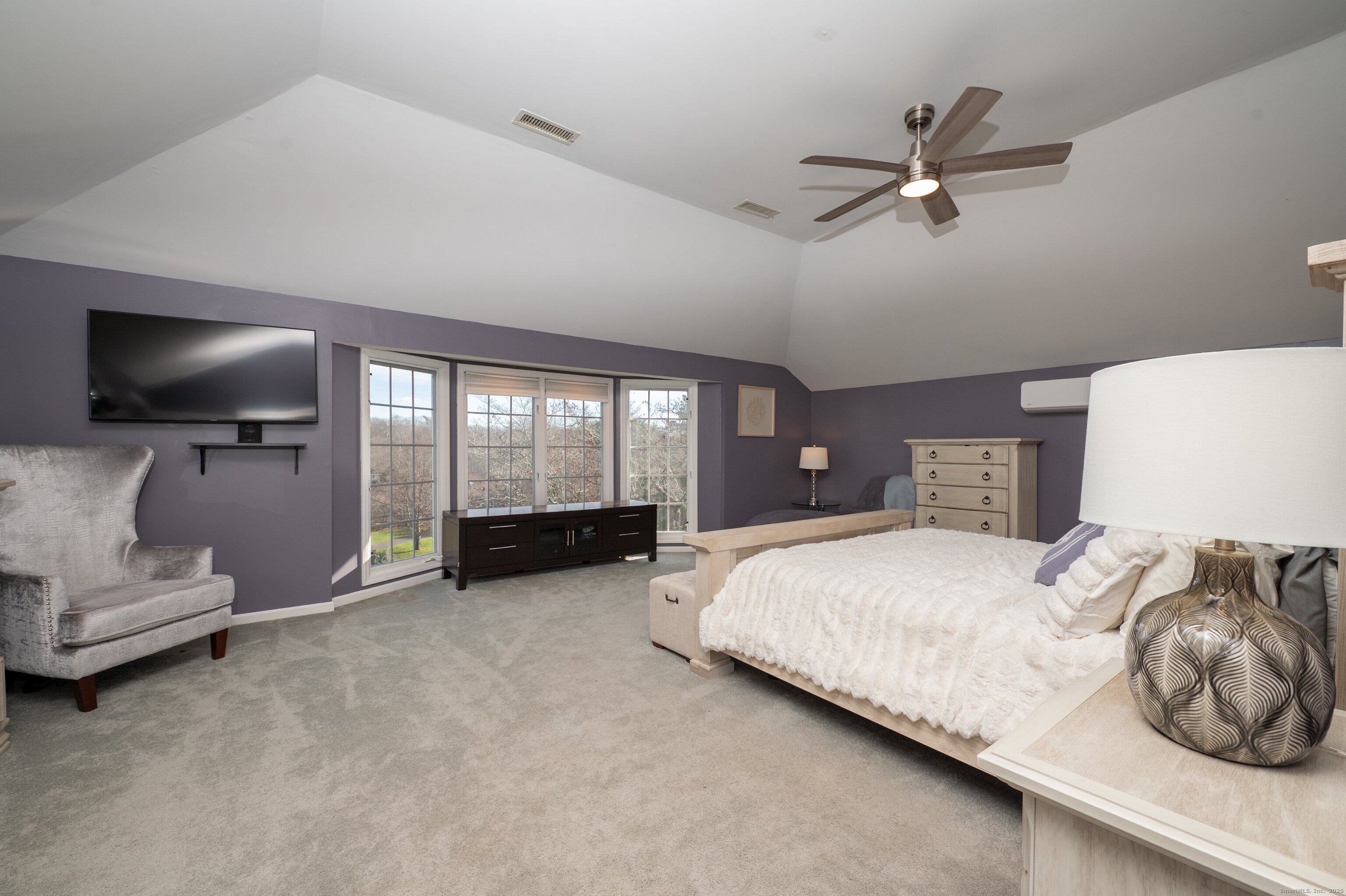 15 Griffing Pond Road Branford, CT 06405 - Photo 32 of 40 a spacious bedroom with a bed and large window