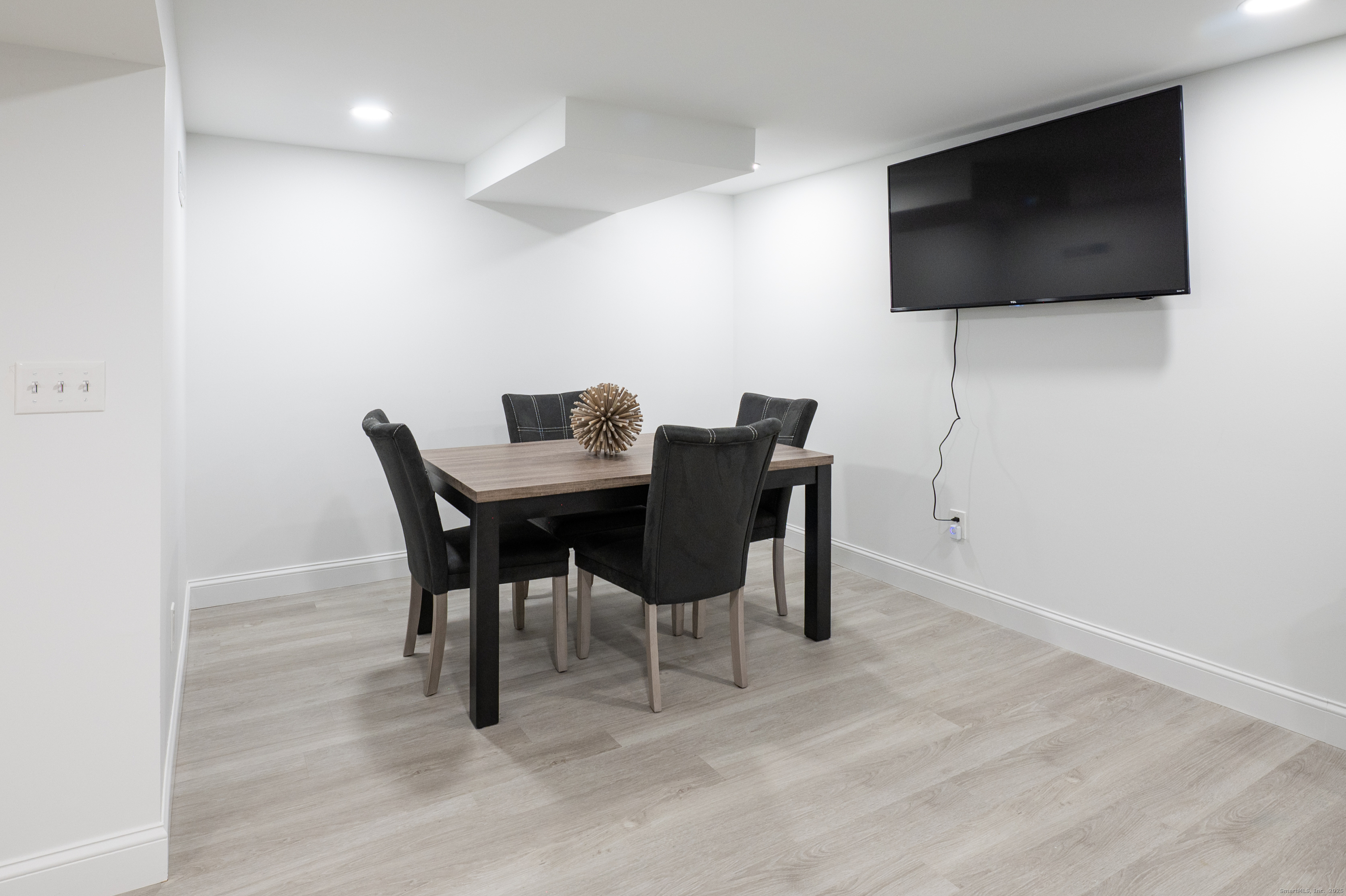 15 Griffing Pond Road Branford, CT 06405 - Photo 39 of 40 a view of a dining room with furniture