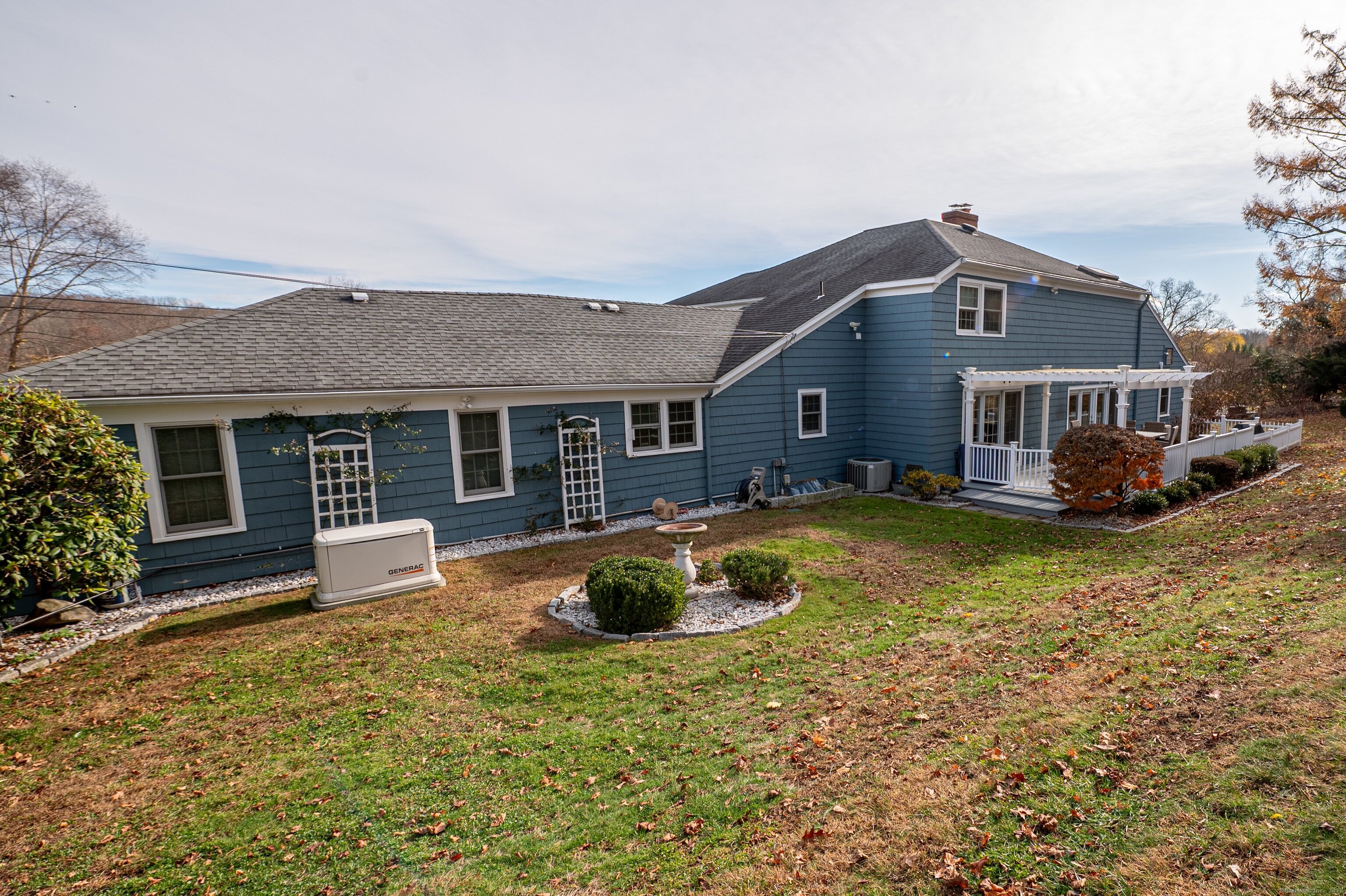 15 Griffing Pond Road Branford, CT 06405 - Photo 6 of 40 a front view of a house with swimming pool