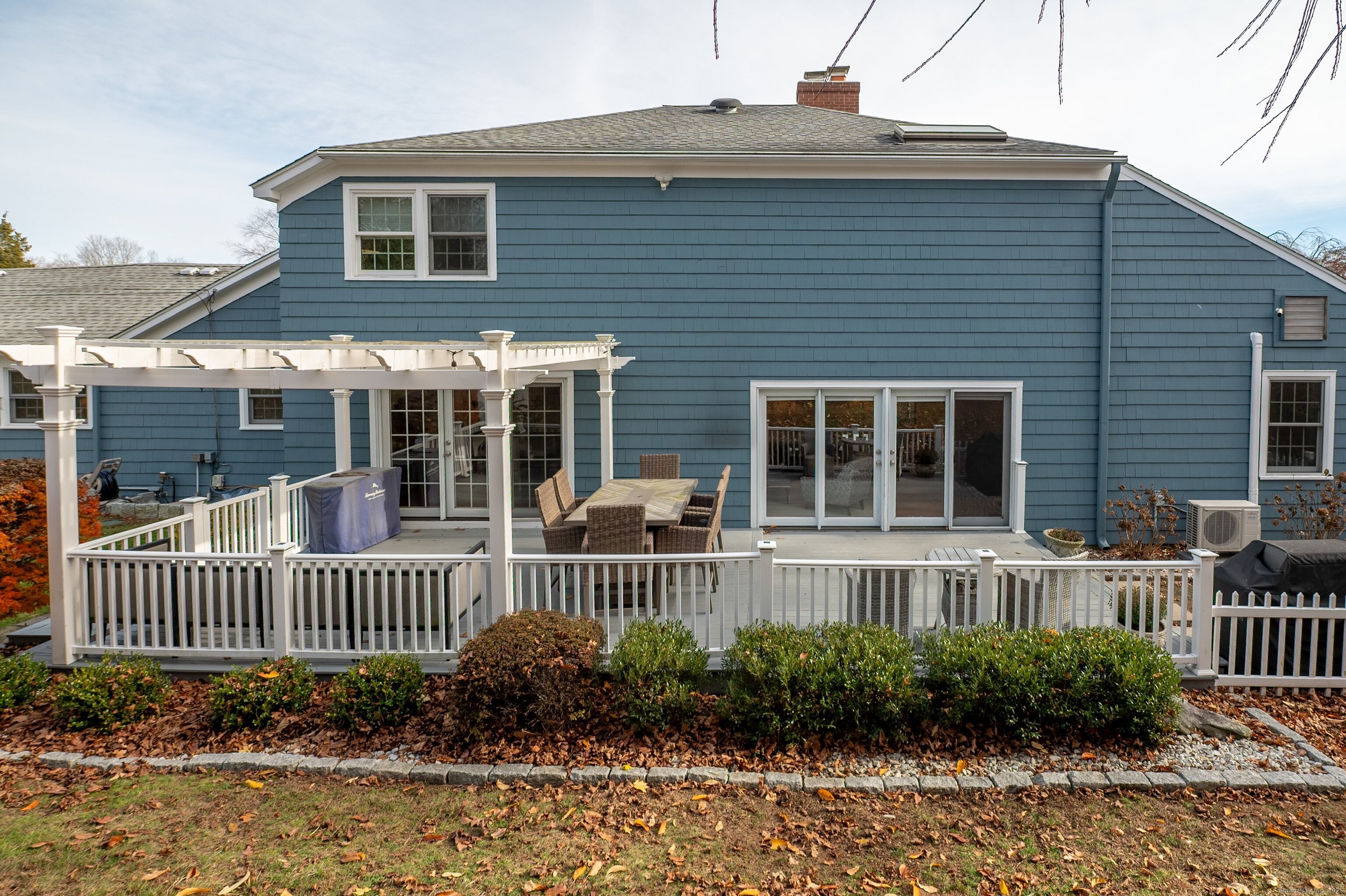 15 Griffing Pond Road Branford, CT 06405 - Photo 7 of 40 a front view of a house with a garden