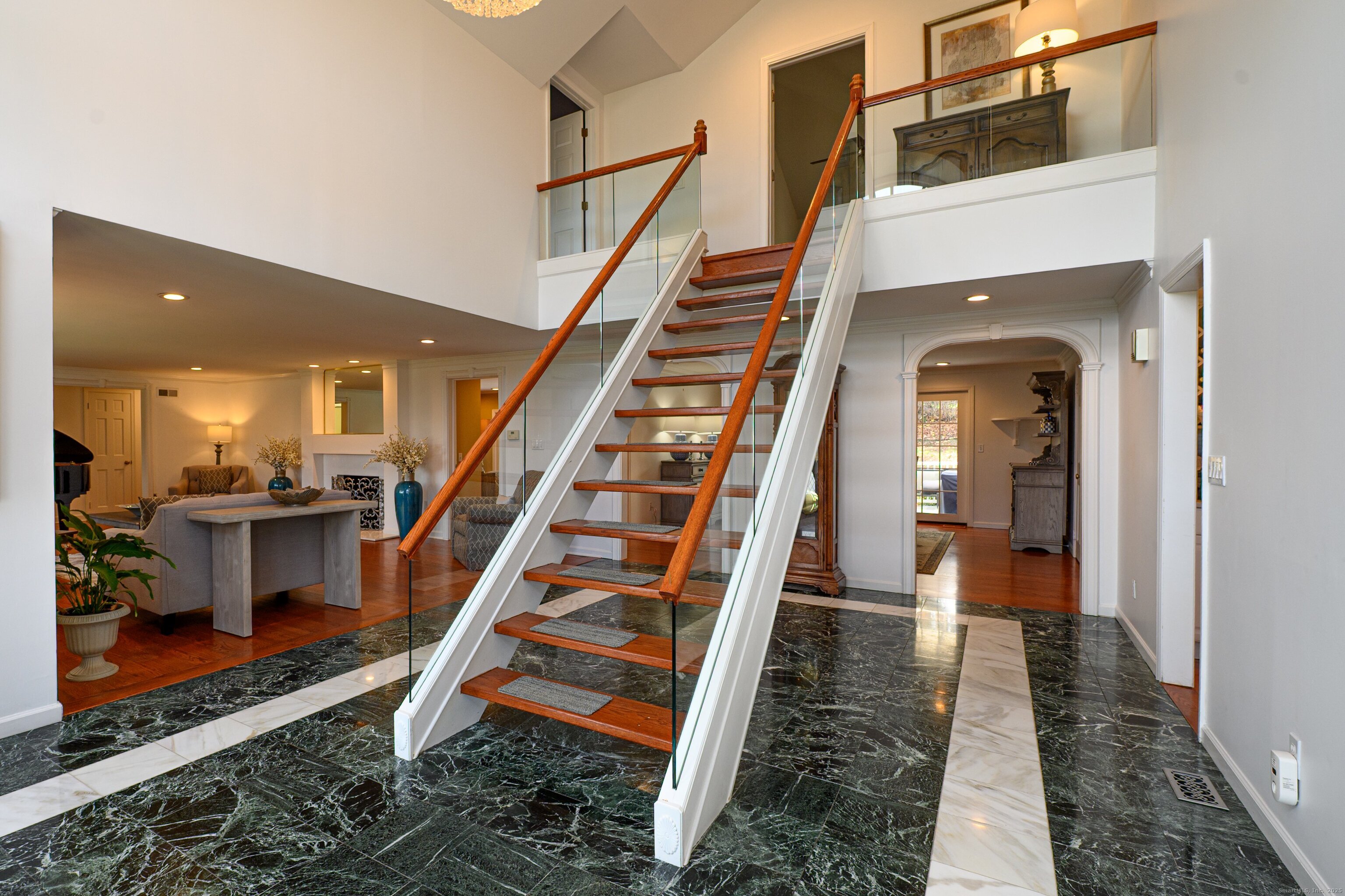 15 Griffing Pond Road Branford, CT 06405 - Photo 9 of 40 a view of entryway and hall with wooden floor