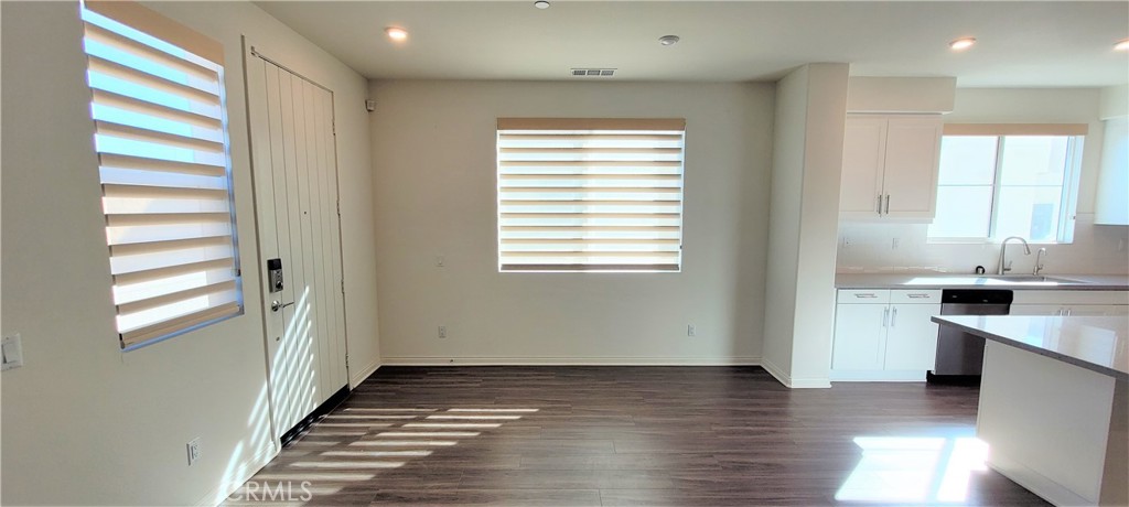 45 Aria Street South El Monte, CA 91733 - Photo 8 of 12 a view of a kitchen from the hallway with a window
