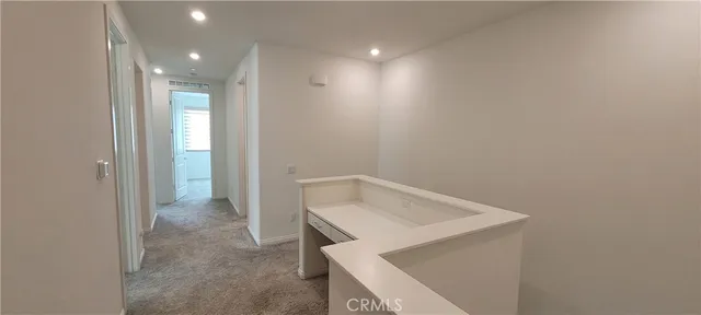 a view of storage and utility room with washer and dryer