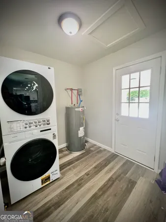 a view of a washer and dryer in a room