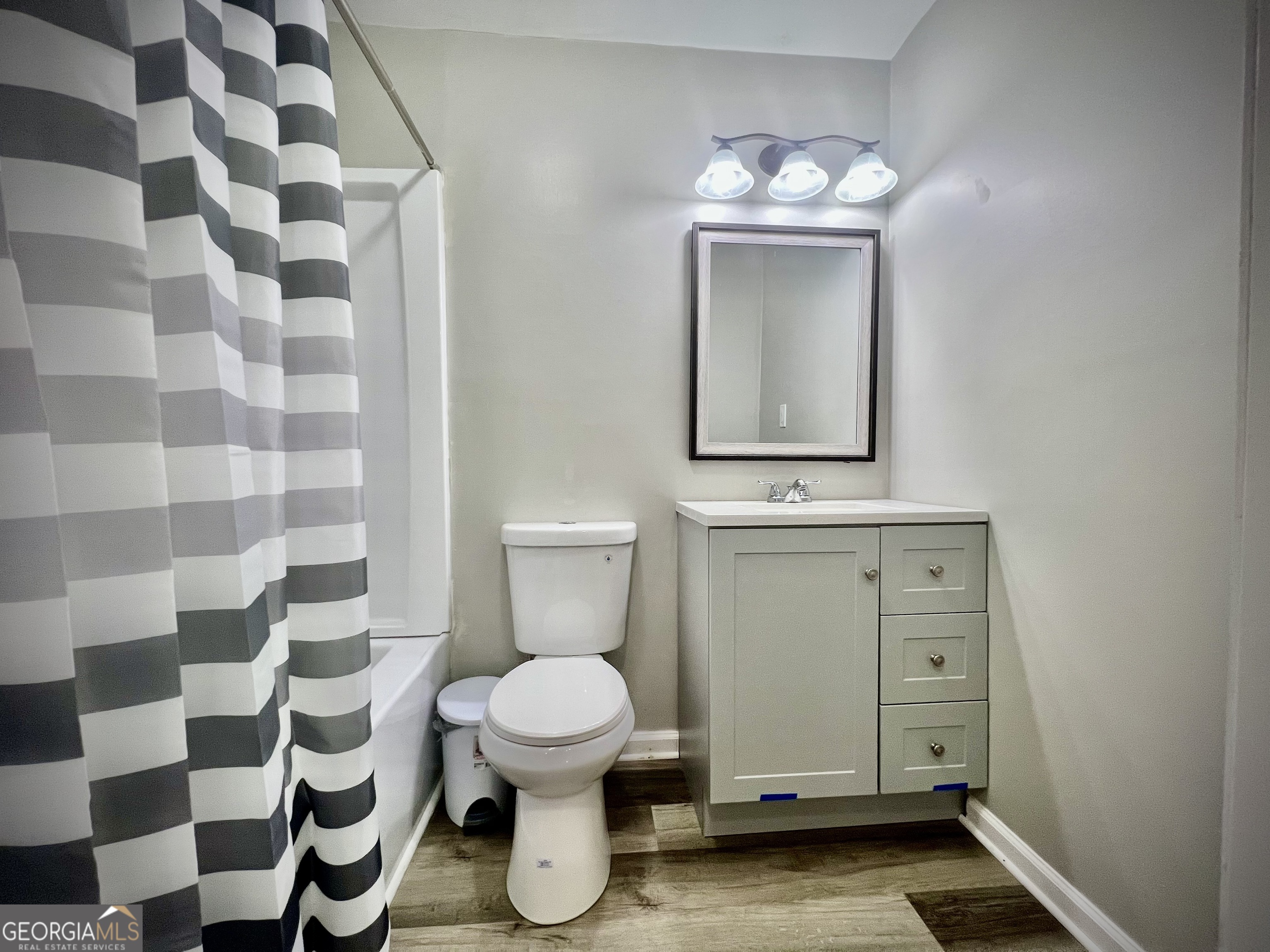 1962 Anderson Road Rentz, GA 31075 - Photo 17 of 26 a bathroom with a sink and a mirror