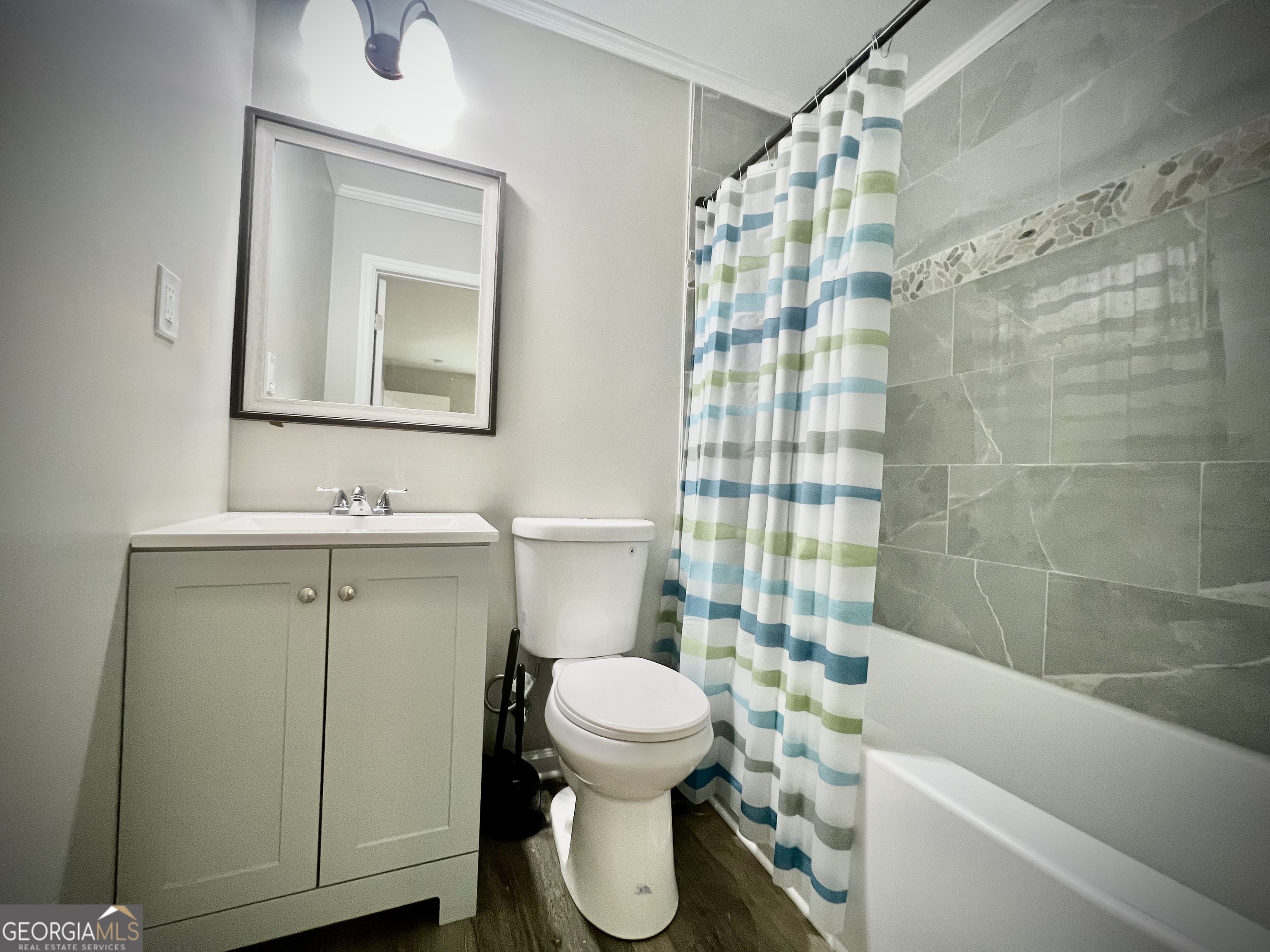 1962 Anderson Road Rentz, GA 31075 - Photo 20 of 26 a bathroom with a sink toilet and shower
