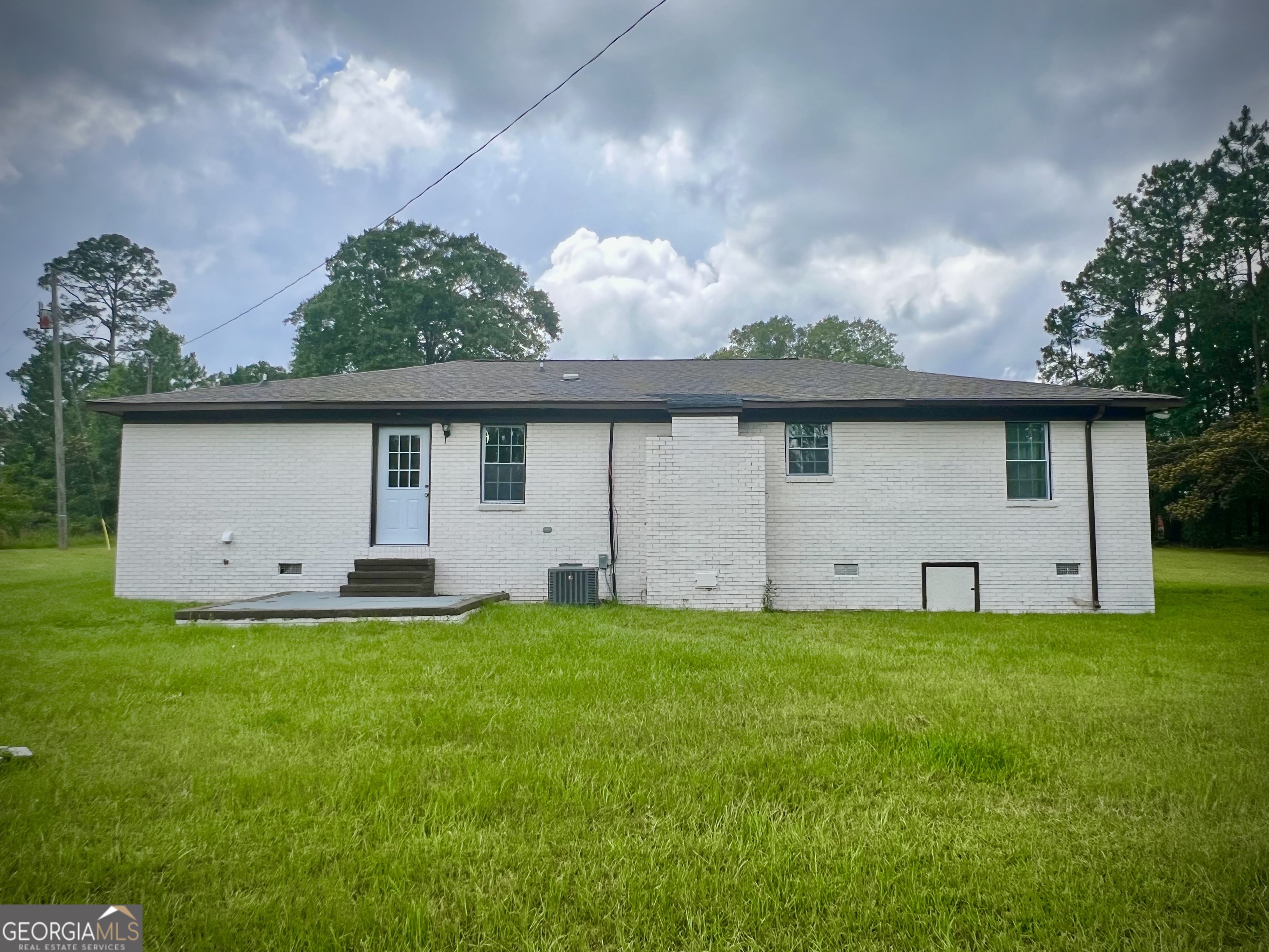 1962 Anderson Road Rentz, GA 31075 - Photo 3 of 26 a view of a house with a yard