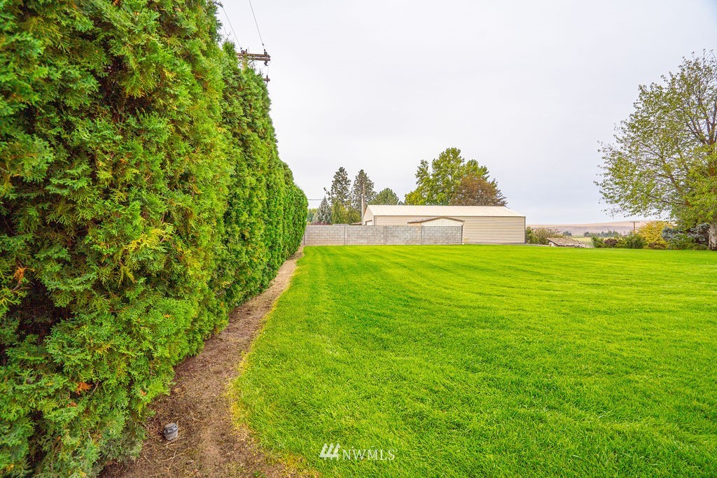 841 South Taylor Road Othello, WA 99344 - Photo 10 of 40 a view of a garden with an outdoor space